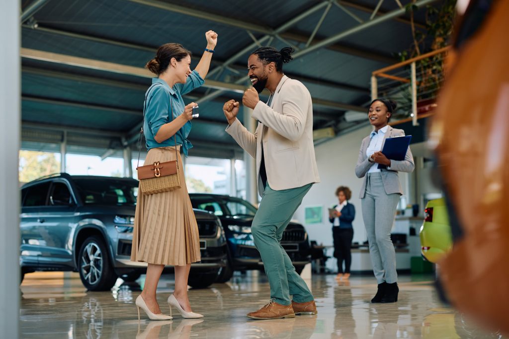 A Happy Couple Buying a New Car