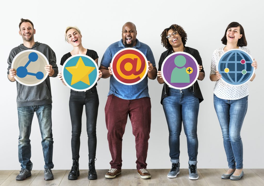 Automotive Social Media Marketing Team Holding Share Symbols